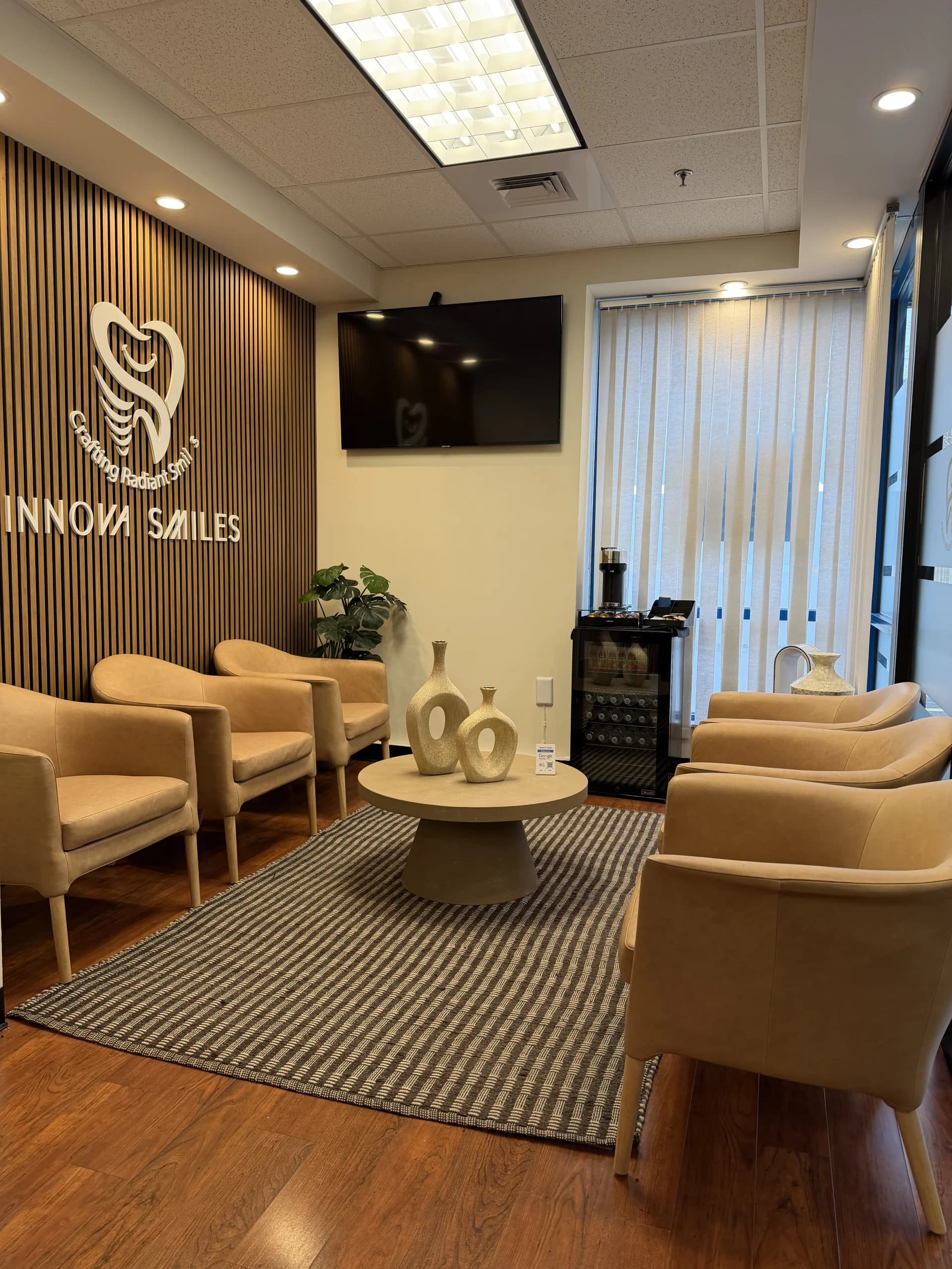Comfortable, modern waiting area at Innova Smiles in Marlborough, MA