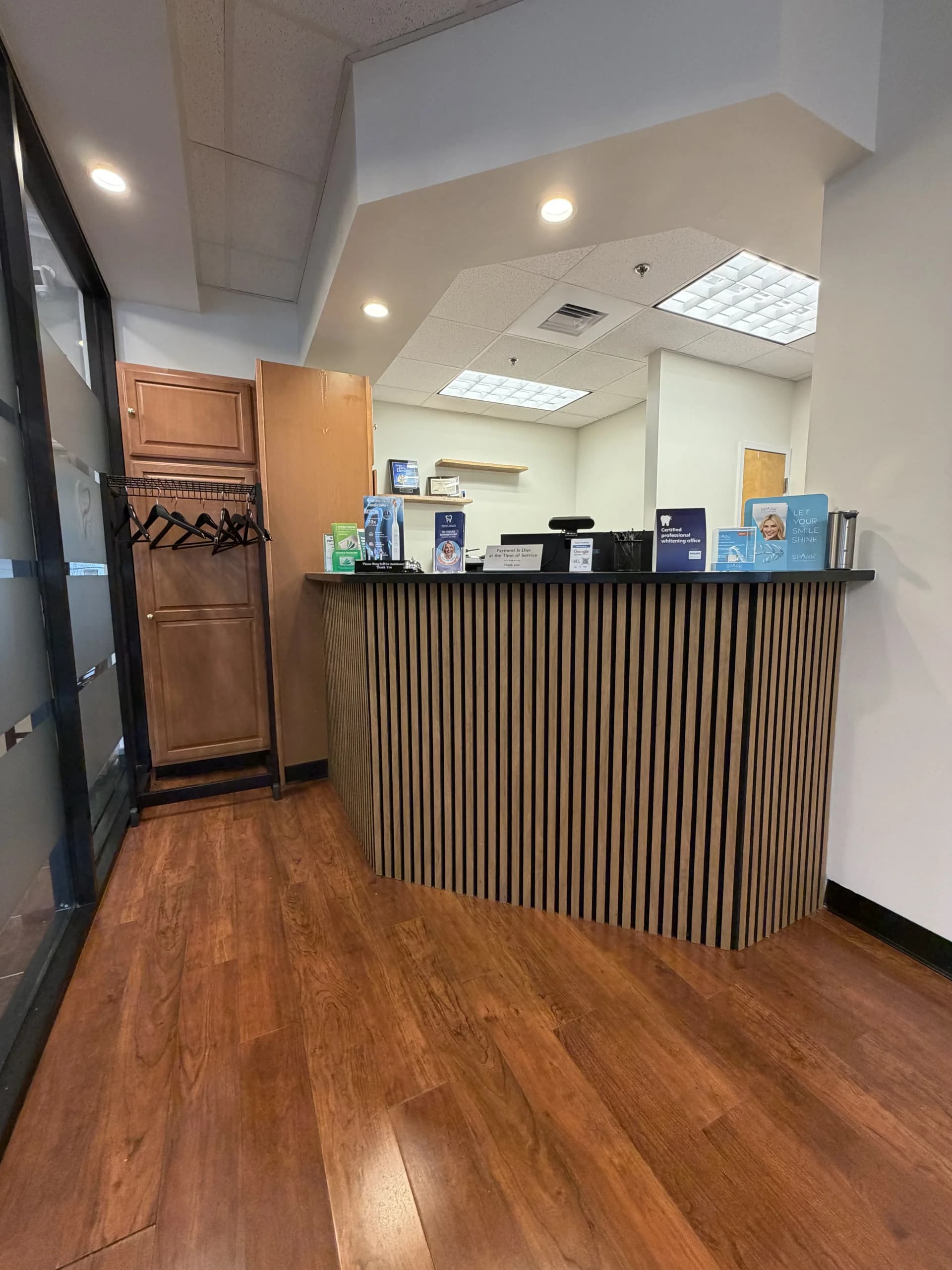 Friendly front desk team welcoming patients at Innova Smiles, Marlborough MA