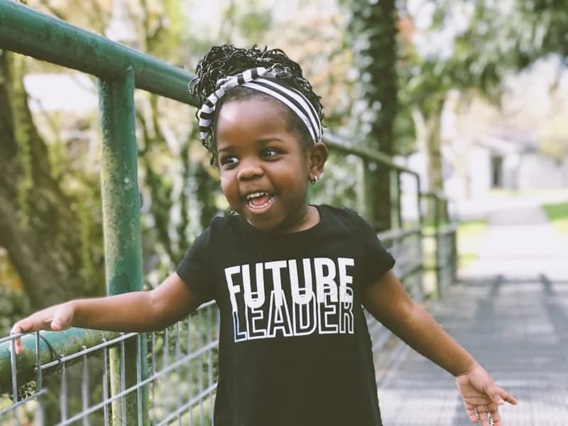 Father and daughter at the playground after emergency dental care at Innova Smiles in Marlborough, MA