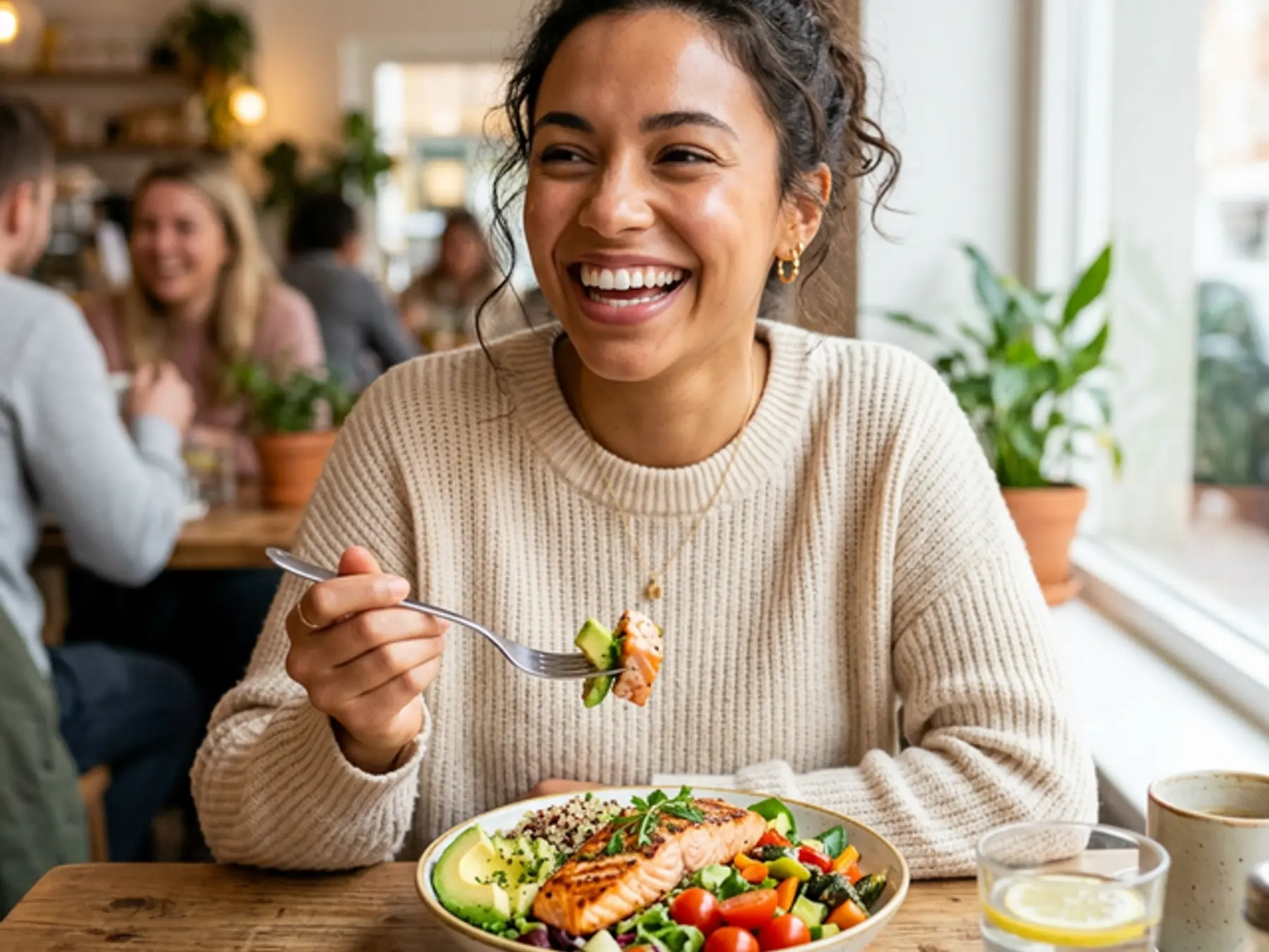 Patient enjoying a meal after tooth extraction and healing at Innova Smiles in Marlborough, MA