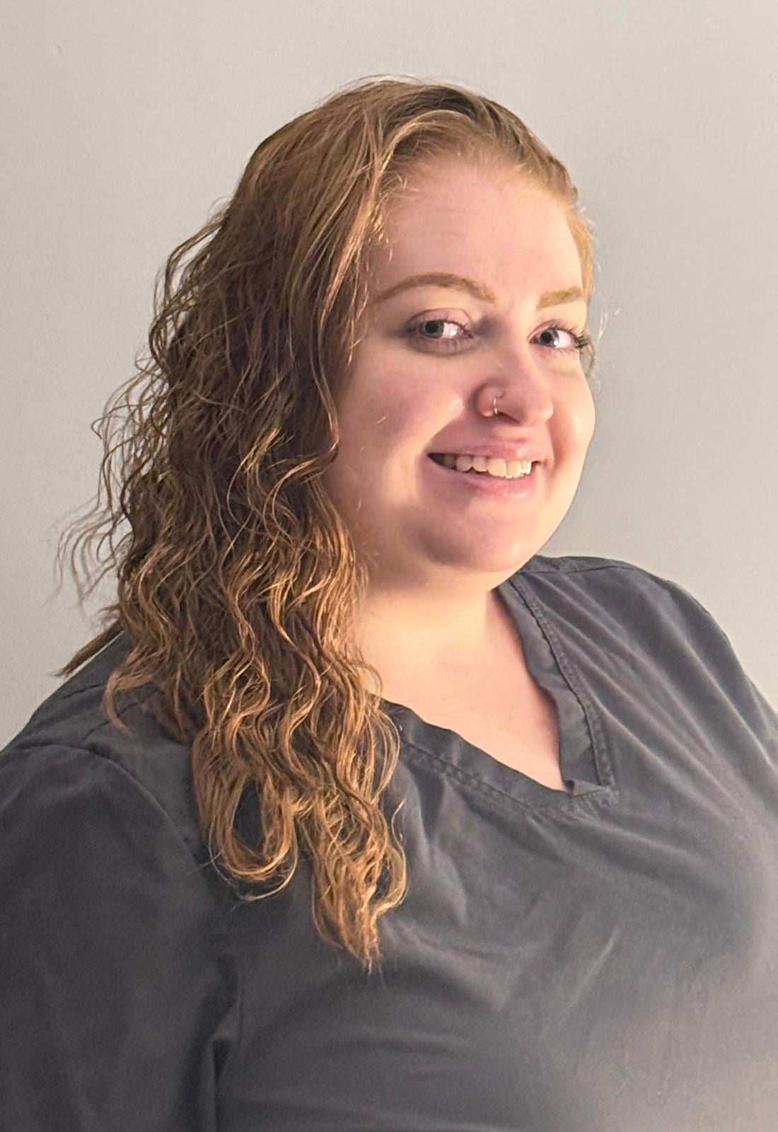 Portrait of Melissa Champagne, Patient Care Coordinator at Innova Smiles