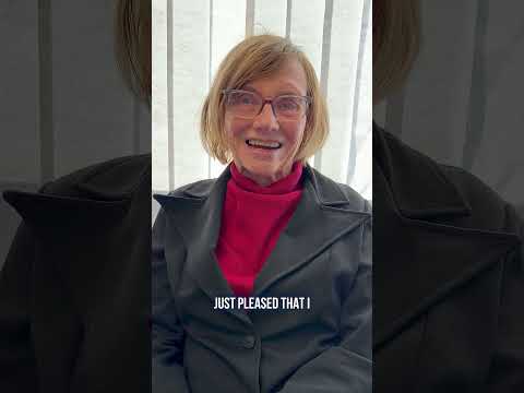 Dental implant patient Nancy Mehson reviewing her implant procedure at Innova Smiles Marlborough MA